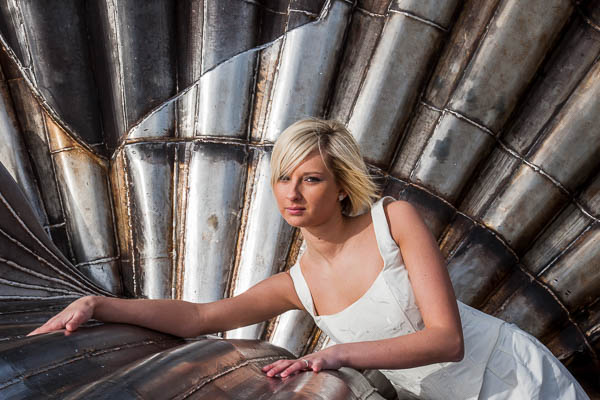 Trash the dress model shoot on Aldeburgh beach Scallop sculpture