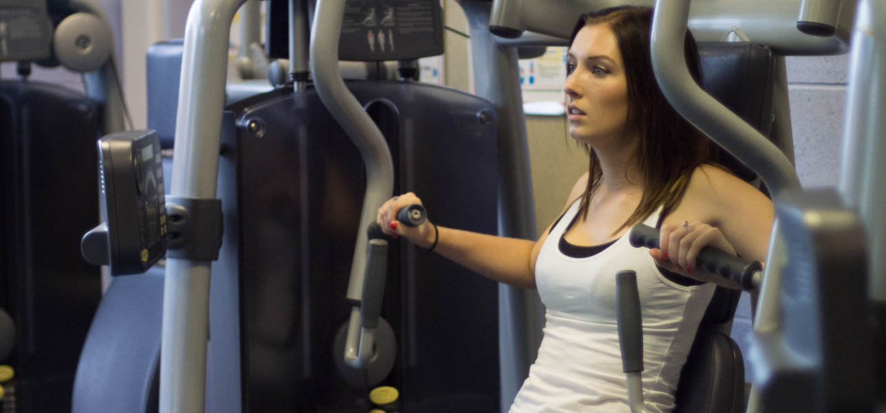 Emily on chest press machine