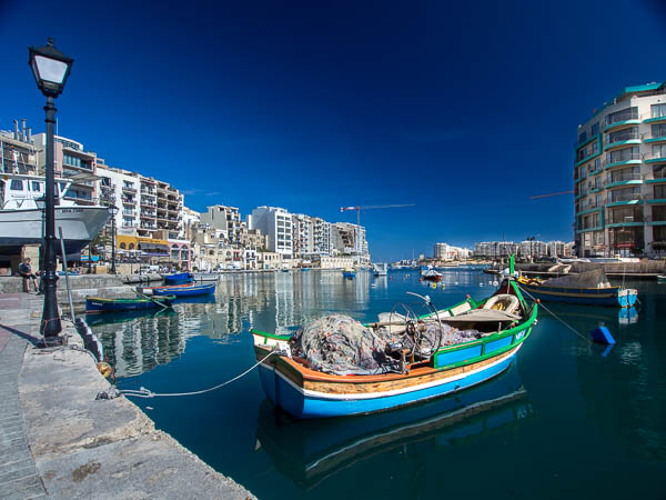 Traditional Maltese fishing boat at St Julian's Bay